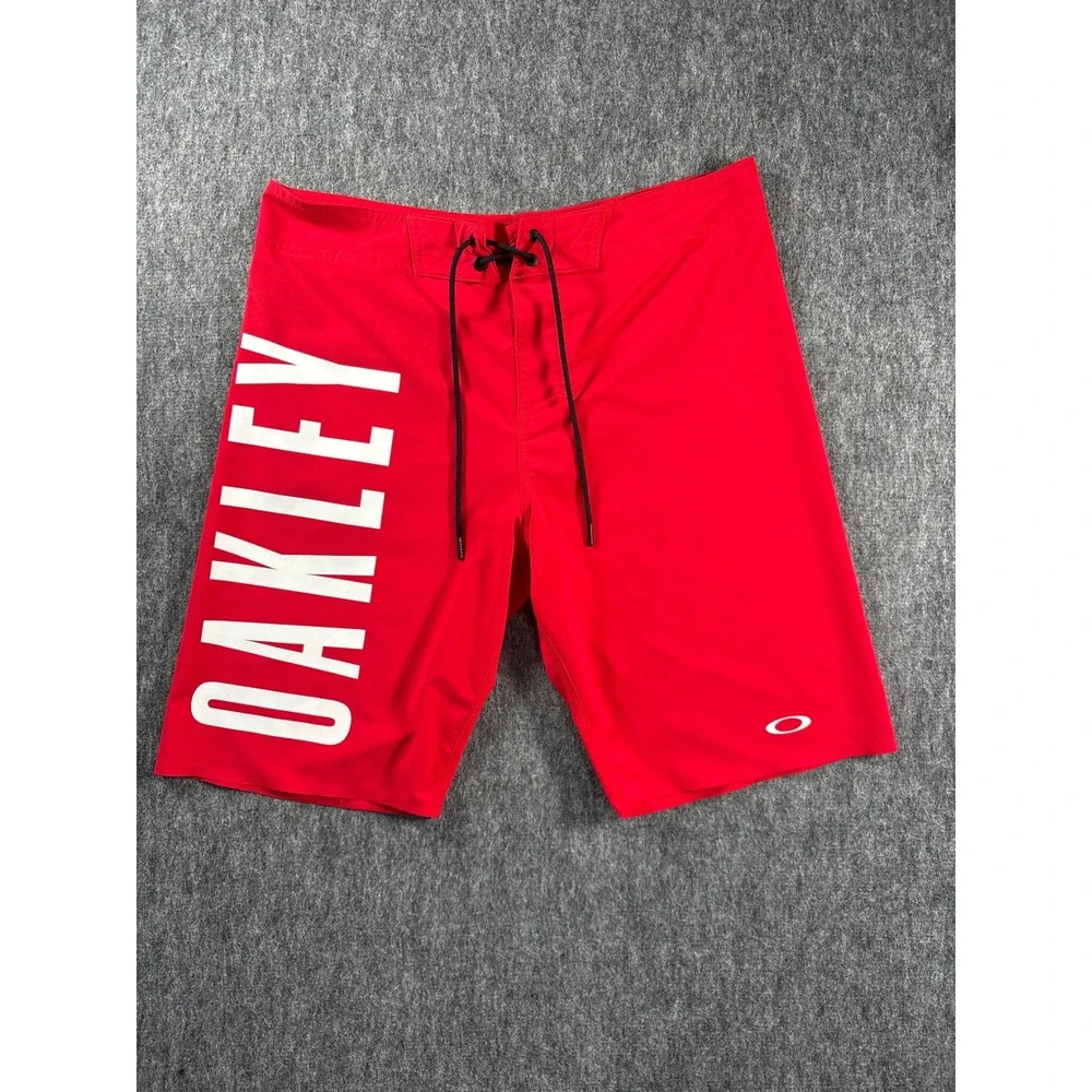 Oakley‎ Mens Red Performance Fit Board Shorts Swim Trunks 33 Logo Back Pocket